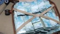 PF apreende em Goiás mala com mais de R$ 800 mil em operação contra fraudes no auxílio emergencial e em precatórios