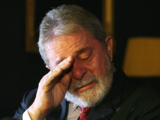 Lula confessa-se diante dos padres, ataca o governo Dilma, afirma que o PT e ele próprio estão no “volume morto” da política e se faz de Josef K.de Kafka em “O Processo”
