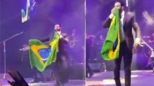 Em contraponto à lacração, Gusttavo Lima beija a bandeira nacional e vídeo viraliza (veja o vídeo)